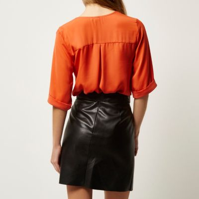 Orange frill wrap blouse